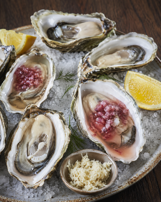 Oysters with red wine shallot mignonette, fresh horseradish and lemon
